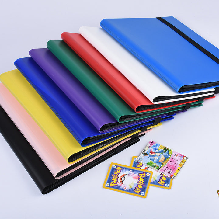 Colorful card binders with a few trading cards on a light gray background